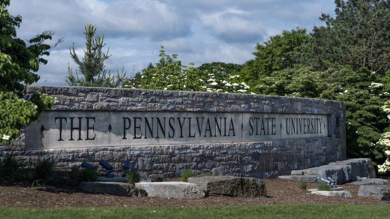Stone sign that says The Pennsylvania State University 