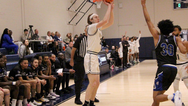 Penn State DuBois senior forward Beau Verdill shoots a three pointer during a home game against Berkeley College at the PAW Center.