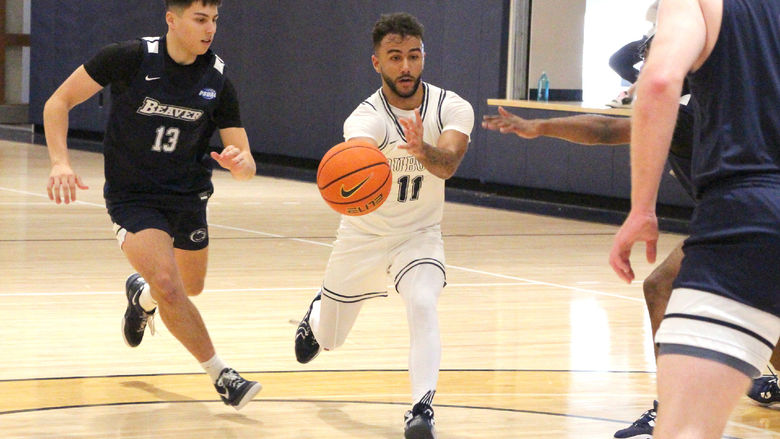 Penn State DuBois sophomore guard Kaleb Pryor drives toward the lane and passes the ball to a teammate during a recent basketball game at the PAW Center.