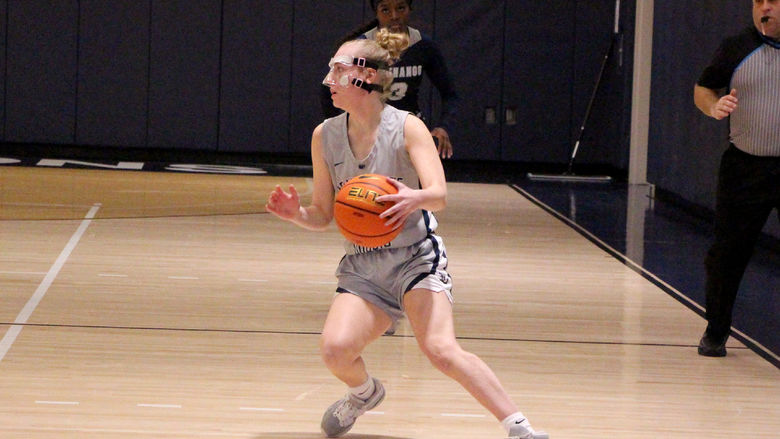 Penn State DuBois sophomore guard Hailey Theuret handles the basketball at the top of the key during a recent home game at the PAW Center.