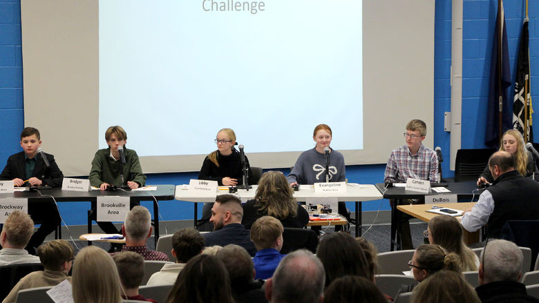 Participants prepare to answer questions during their preliminary round during the junior scholastic challenge in the Hiller Auditorium at Penn State DuBois.
