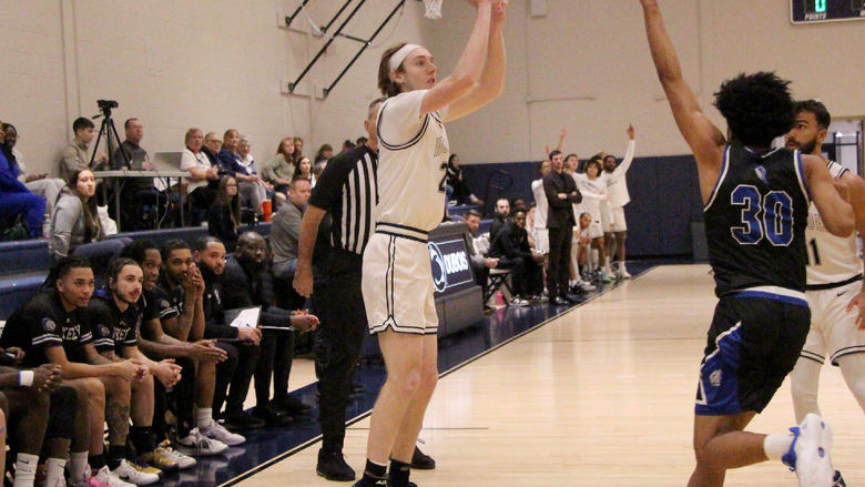 Penn State DuBois senior forward Beau Verdill gets a contested three pointer away during a recent home game at the PAW Center, on the campus of Penn State DuBois.