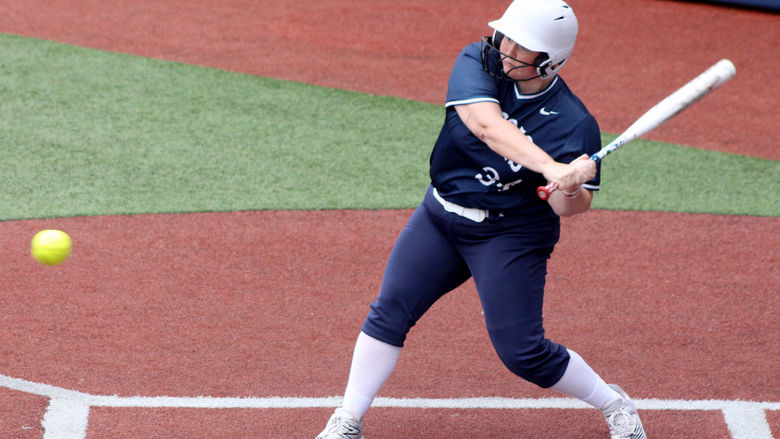 Penn State DuBois senior Chelsea Busatto starts her swing towards the ball during a recent home game at Heindl Field in DuBois.