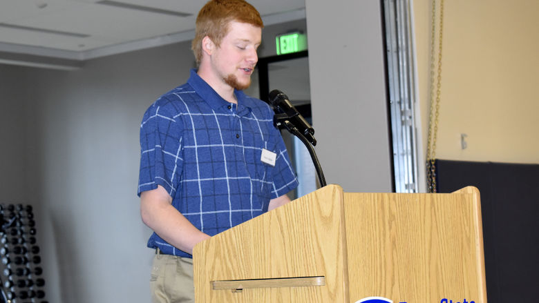 Penn State DuBois student Noah Gibble speaks during the scholarship luncheon at the PAW Center.