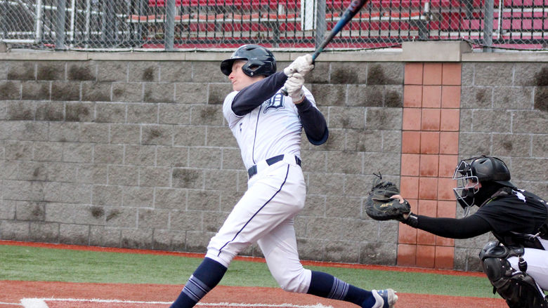 Penn State DuBois junior Alex Gavlock follows through with his swing on a base hit during a recent home game at Showers Field in DuBois.