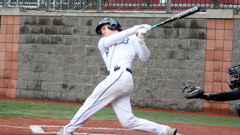 Penn State DuBois sophomore Braylen Corter follows through on his swing and watches the ball fall in for a base hit during a recent home game at Showers Field in DuBois.