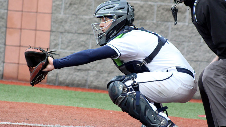 Penn State DuBois junior Grant Lillard shows his target to his pitcher and awaits the delivery of a pitch during a recent home game at Showers Field in DuBois.