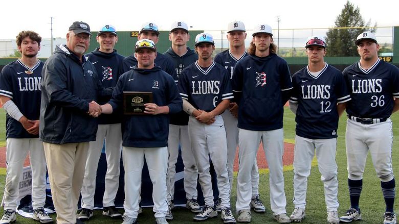 Members of the Penn State DuBois baseball team accept the runner up plaque for the 2025 PSUAC baseball season following the championship series at Showers Field in DuBois.