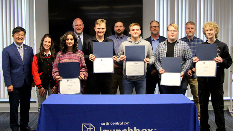 Students from the inaugural cohort of the Industry 4.0 Academy display their program certificates received during the certificate presentation ceremony held at Penn State DuBois. Students were joined by faculty and staff members from Penn State DuBois, the NCPA LaunchBox and the DuBois Area School District. 