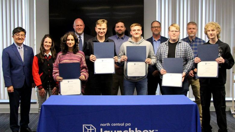 Students from the inaugural cohort of the Industry 4.0 Academy display their program certificates received during the certificate presentation ceremony held at Penn State DuBois. Students were joined by faculty and staff members from Penn State DuBois, the NCPA LaunchBox and the DuBois Area School District. 
