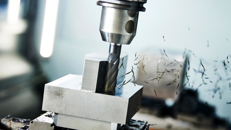 A CNC mill shaping a metal part. Penn State DuBois Continuing and Community Education is preparing to offer two CNC related training courses, scheduled to begin in mid-August.