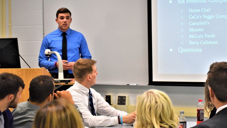 Noah Rankin was among the business students who presented potential ways to spur economic growth . 