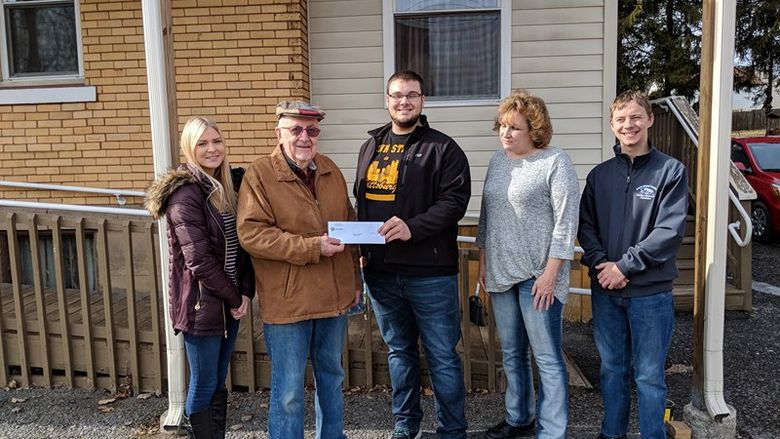 From left to right, Leandra Demarco; Keith Smith, president director of Haven House; Ryan Lingle; Michaelene Hawley, Haven House director; and Duncan LaValle.