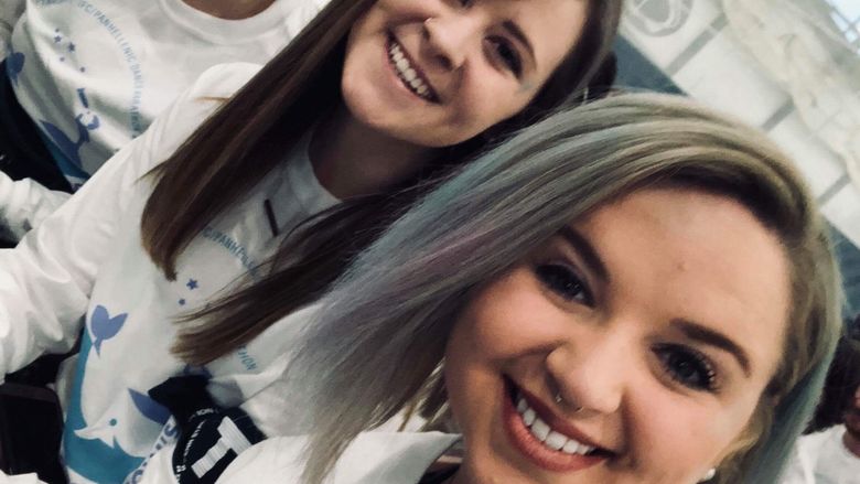  Julia Test, Brynn Morgan, and Alaina Shaffer on the floor at THON. 