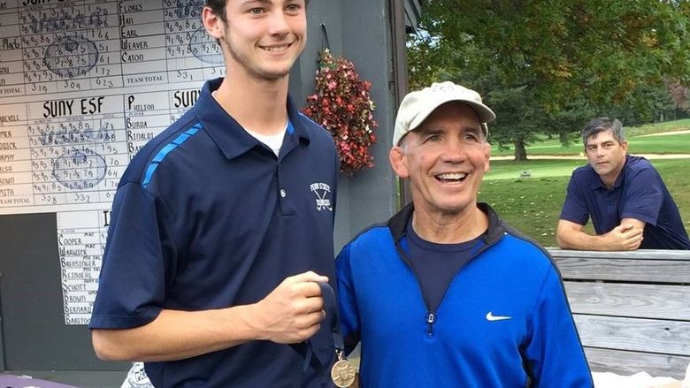 Penn State DuBois Golfer Tyler Woodard with PSUAC Commissioner John Fritz.    