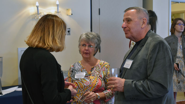 Donors speaking with students