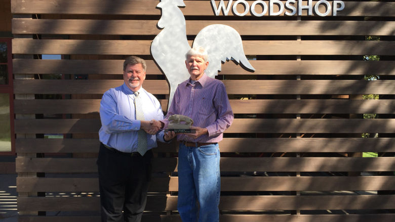 Lifetime Alumni Award recipient Bob Umbaugh, right, was presented with his award by Chancellor M. Scott McBride, left.