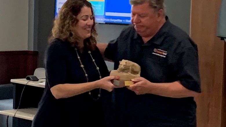 DEF President Kristen Vida recently presented Penn State DuBois Chancellor M. Scott McBride with a Nittany Lion statue recognizing his service to the campus.  McBride will retire July 1. 