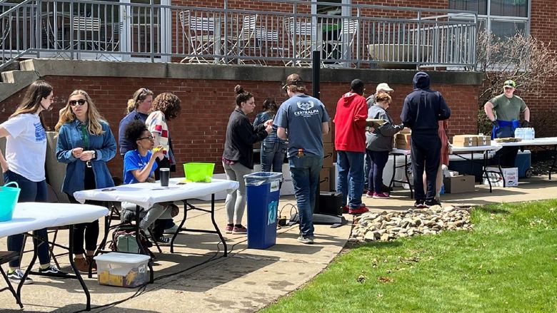 Students and community collaborate on the DEF lawn for an Earth Day celebration