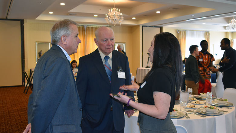 Donors speaking with students