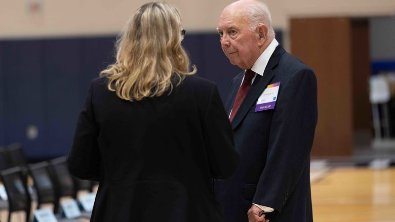 Jean Wolf speaking with Charles Snapp