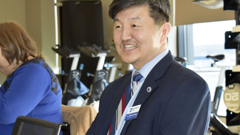 Dr. Jungoo Ryoo, chancellor and chief academic officer speaks to graduates at a celebratory lunch.