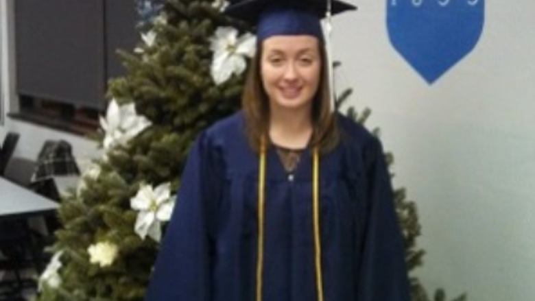 Katrina Anderson in her cap and gown after graduation.