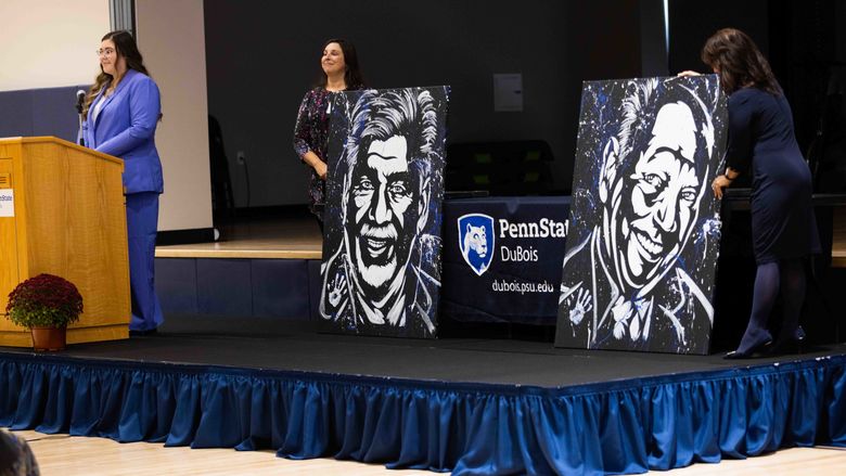 Painting reveal of Scott McBride and Charles Snapp