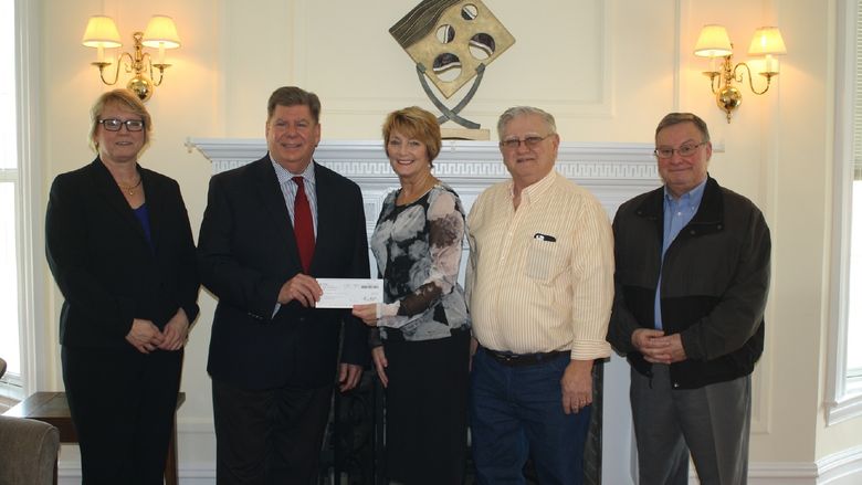  left to right, Penn State DuBois Director of Development Jean Wolf and Chancellor M. Scott McBride accepting a gift from Trustees for the A.J. and Sigismunda Palumbo Charitable Trust, Karin Pfingstler, Joe Palumbo, and Bob Ordiway. 