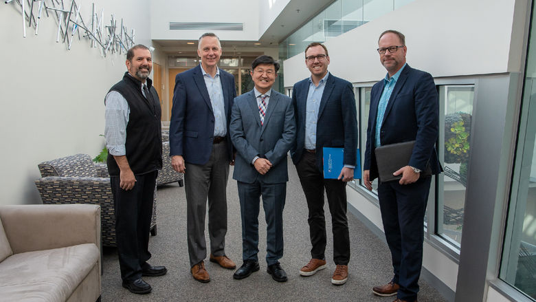 Brennan, Reed, Ryoo, Gasbarre and Lashinsky gather in the administrative building at PCT.