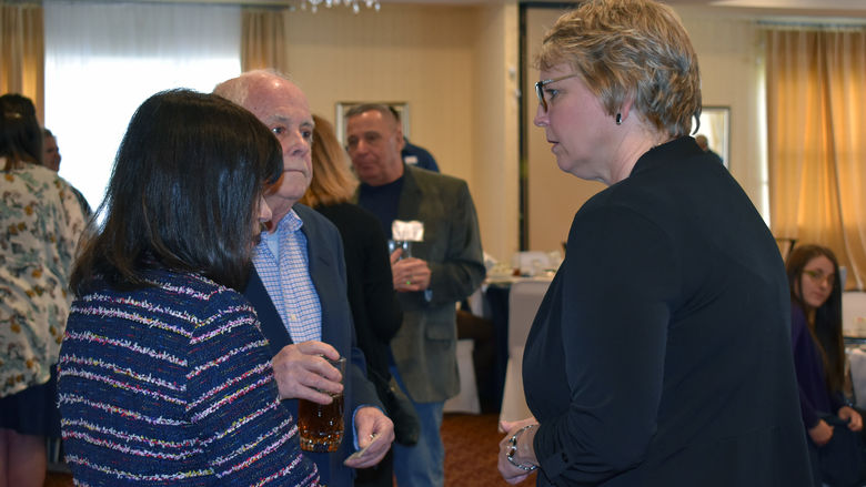 Donors speaking with staff