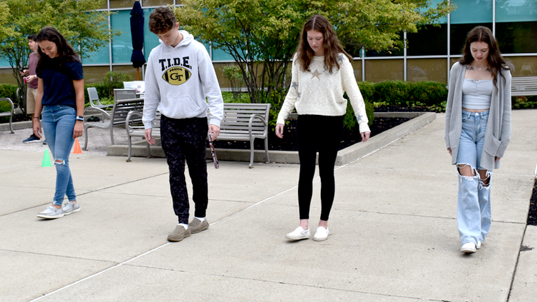 Students are given a field sobriety test during an alcohol awareness class.