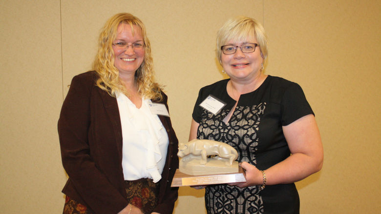 Outstanding Alumni Award Marcella Jo Lucas '89, was presented heraward by Sheri Little '88