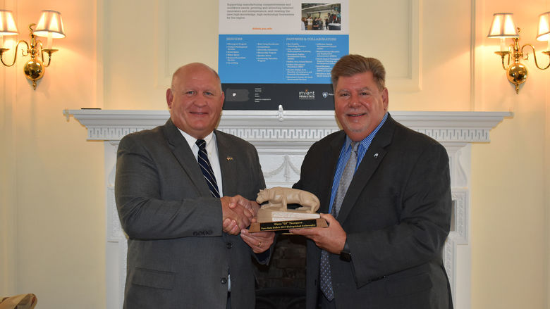 Glenn "GT" Thompson, Distinguished Ambassador Award recipient (left) was presented with his award by Chancellor M. Scott McBride (right).
