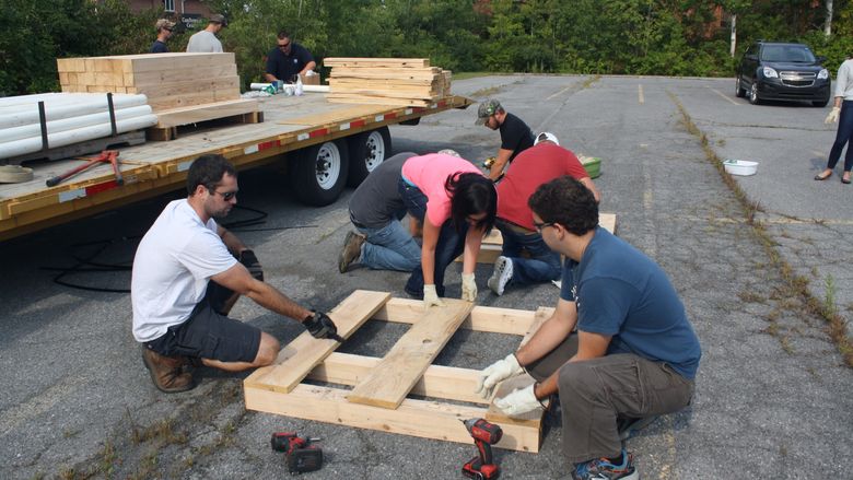 Students work to build basking platforms 