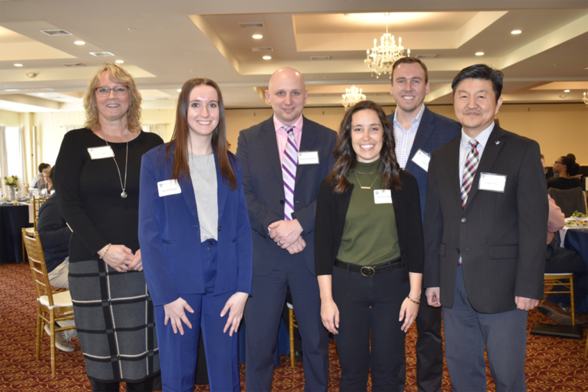 Students pose with donors at the 2022 scholarship lunch