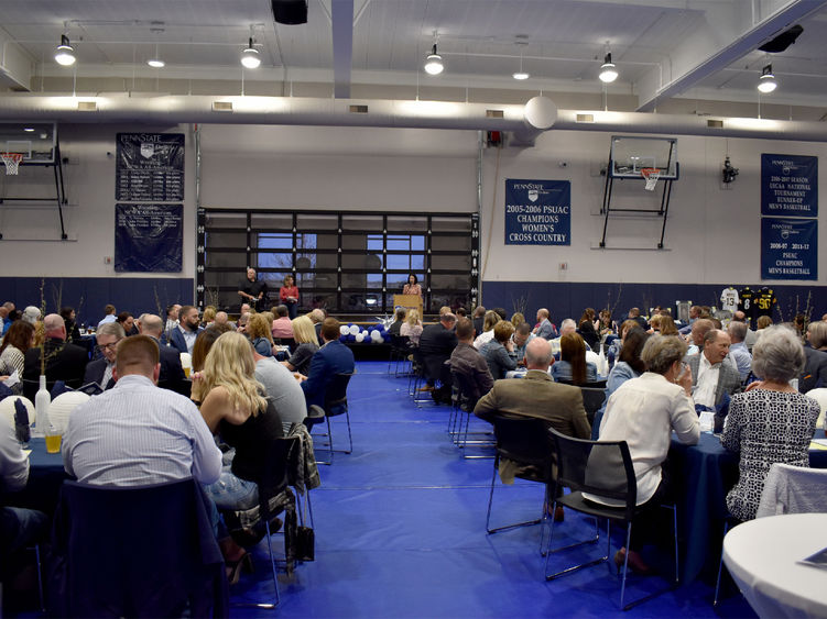 Kristen Vida welcomes everyone to the Lion Wine and Cheese event at the PAW Center on the campus of Penn State DuBois