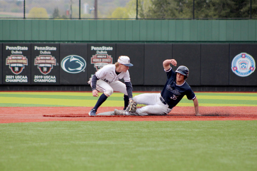 Penn State DuBois freshman Alex Gavlock applies a tag at second base to a New Kensington runner during a recent home game at Showers Field