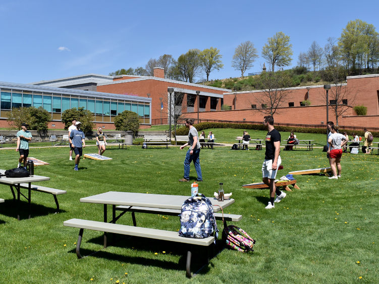 Students at Penn State DuBois enjoy some games outside on the DEF Lawn during the Earth Day celebration on campus