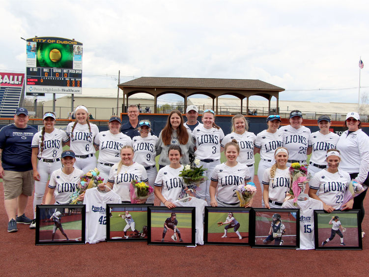 The softball team at Penn State DuBois gathering for a team photo during senior day festivities at Heindl Field
