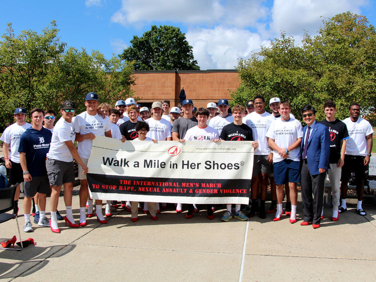 Participants from Penn State DuBois gathered for a group photo prior to “Walking a Mile in Her Shoes”.