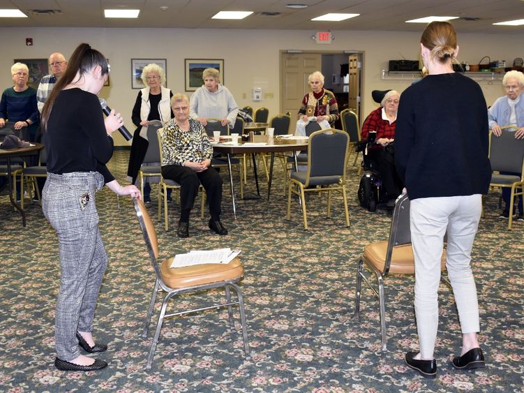 Students demonstrating exercises for balance