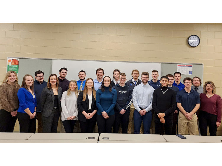 Student presenters gather for a group photo with Laurie Breakey, associate teaching professor of business administration, and Jodi August, executive director of the Greater DuBois Chamber of Commerce and Economic Development, following the conclusion of their presentations at Penn State DuBois.