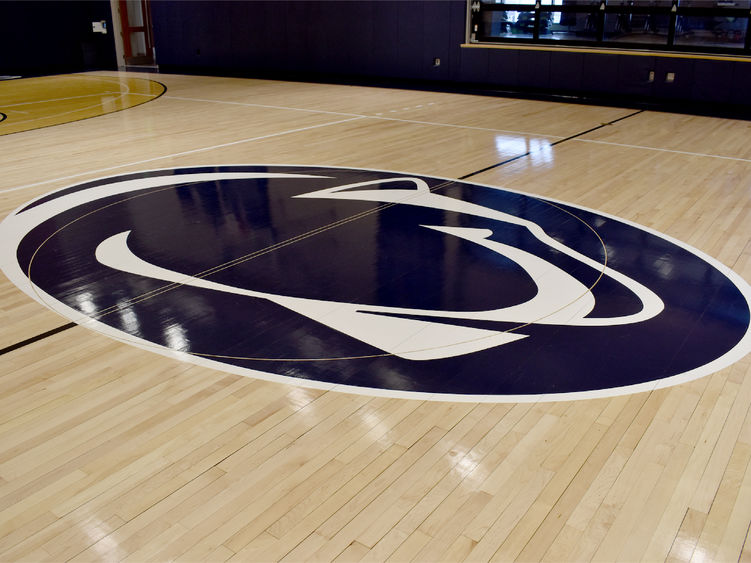 The Nittany Lion logo at center court on the basketball floor at the PAW Center on the campus of Penn State DuBois