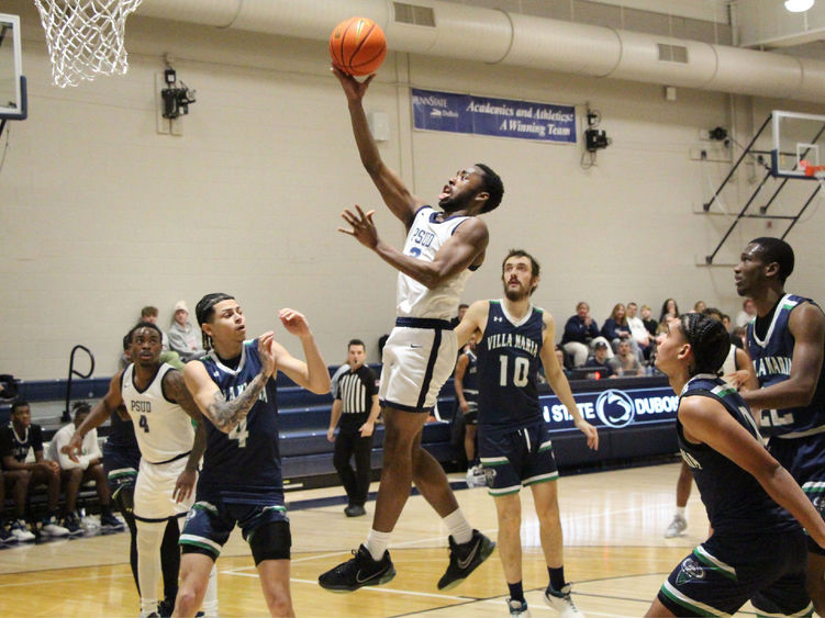 Penn State DuBois senior guard Jaiquil Johnson drives the lane and attempts a layup during a recent basketball game at the PAW Center, on the campus of Penn State DuBois.