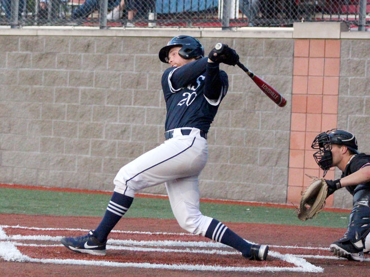 Penn State DuBois senior third baseman Tyler Yough follows through with his swing during a game last season at Showers Field in DuBois.