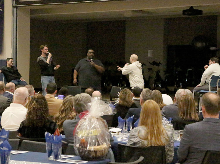 Happy Valley Improv performing on stage at the PAW Center during the Lions, Legacy and Laughter event during We Are Weekend at Penn State DuBois.