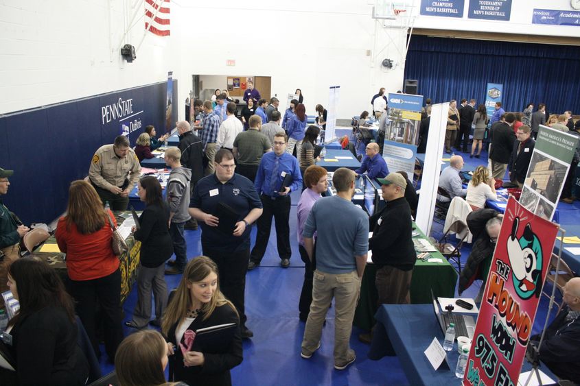 Job seekers learn about career opportunities from local industry representatives. 