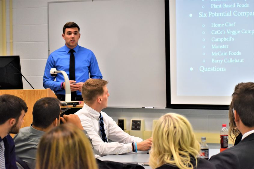 Noah Rankin was among the business students who presented potential ways to spur economic growth . 