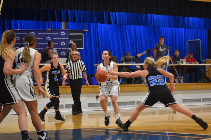 Lexey Shick, at center, moves in for a shot.